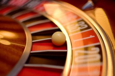 Live roulette wheel and dealer at dewaxx studio